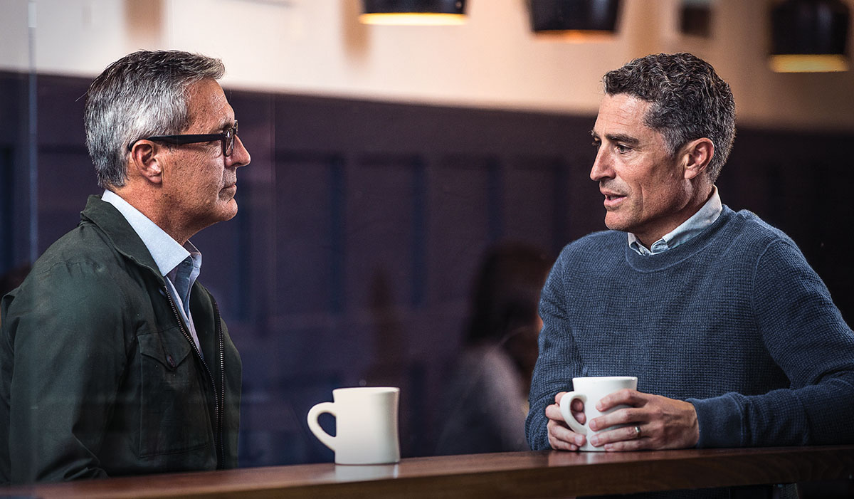 A man who is coping with suicidal thoughts talks to another man