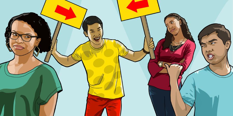 A teenage boy draws attention to what he is wearing while other teenagers look disgusted