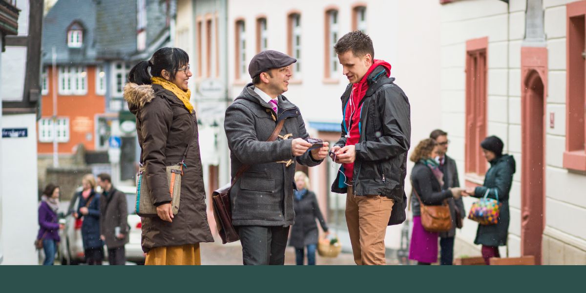 Jehovah’s Witnesses offer the congregation meeting invitation