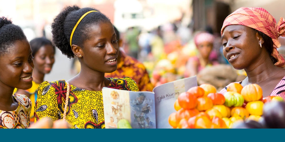 Preaching in a market in Sierra Leone