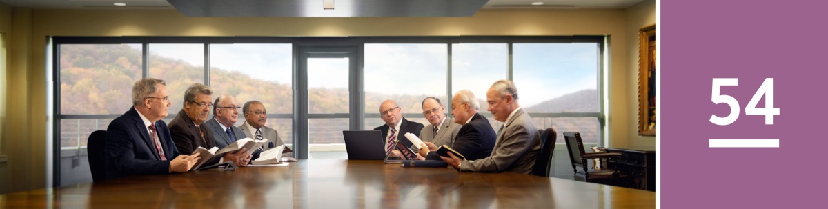 Lição 54. Membros do Corpo Governante das Testemunhas de Jeová reunidos.