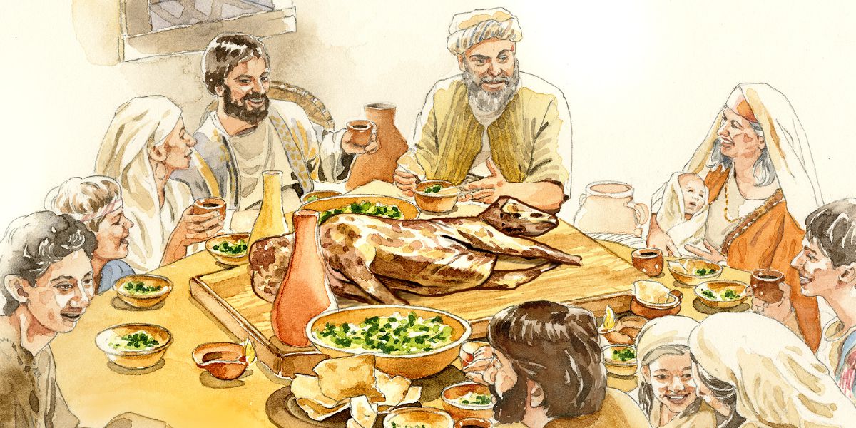 Una família de temps bíblics pren el menjar de la Pasqua