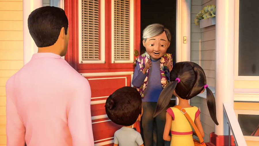Una escena del vídeo Fes-te amic de Jehovà. Predica en un altre idioma. La mateixa dona reacciona feliçment quan Caleb i Sofia la saluden en xinés.