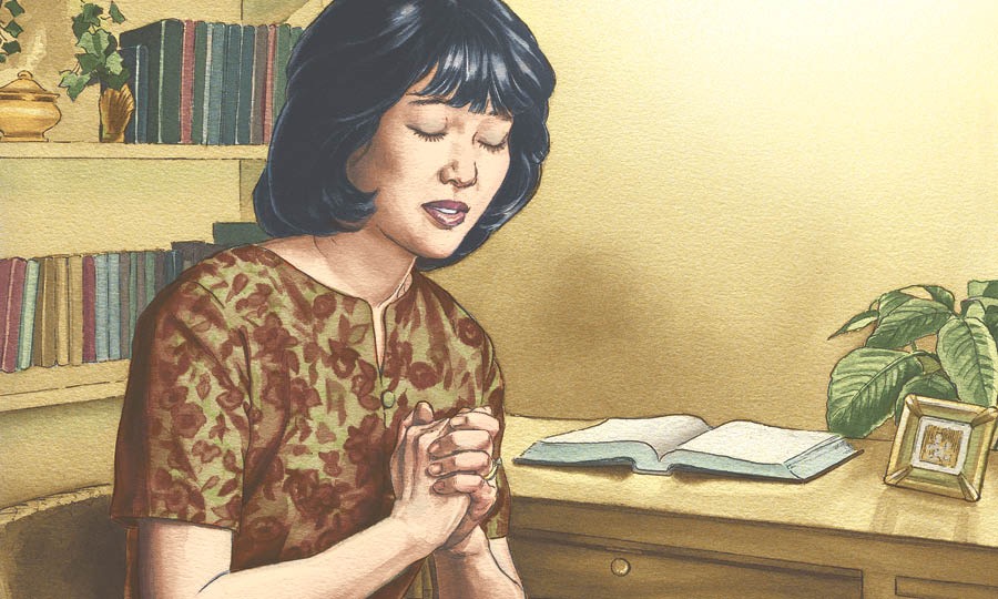 一個女子在禱告中獻身給上帝