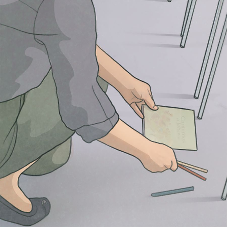 Una persona limpiando y ordenando el lugar donde se ha sentado en el Salón