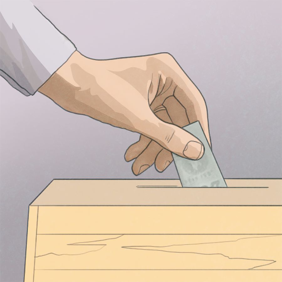 Una persona dejando una donación en la caja de contribuciones