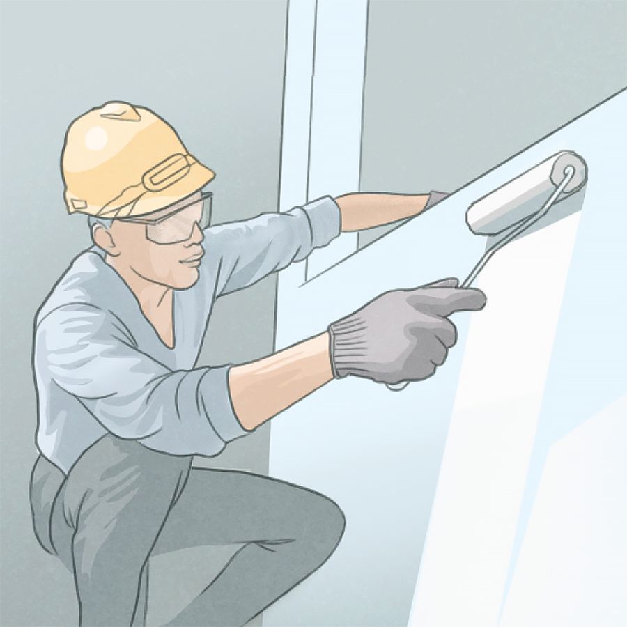 Un hermano pintando una pared del Salón del Reino