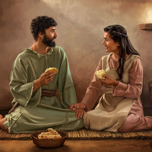 古代以色列的一对夫妻在简朴的房子里吃着饼，享用简单的一餐。