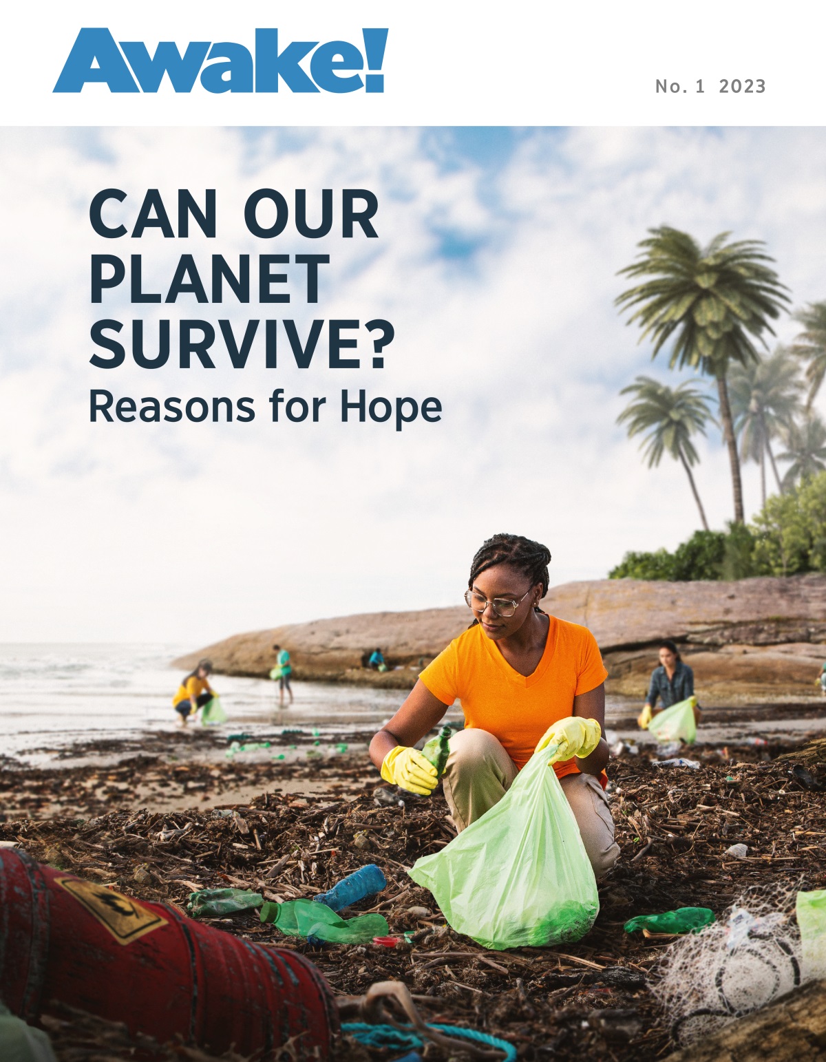 A group of people picking up trash at a beach.