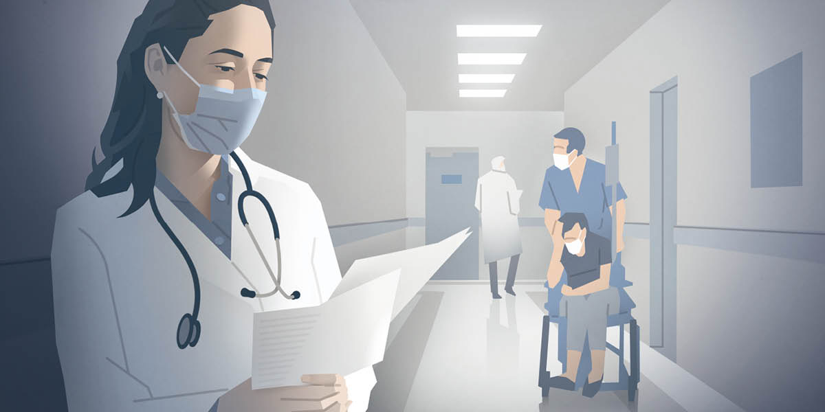 A medical professional in a hospital corridor, reading a printout of an article from jw.org.