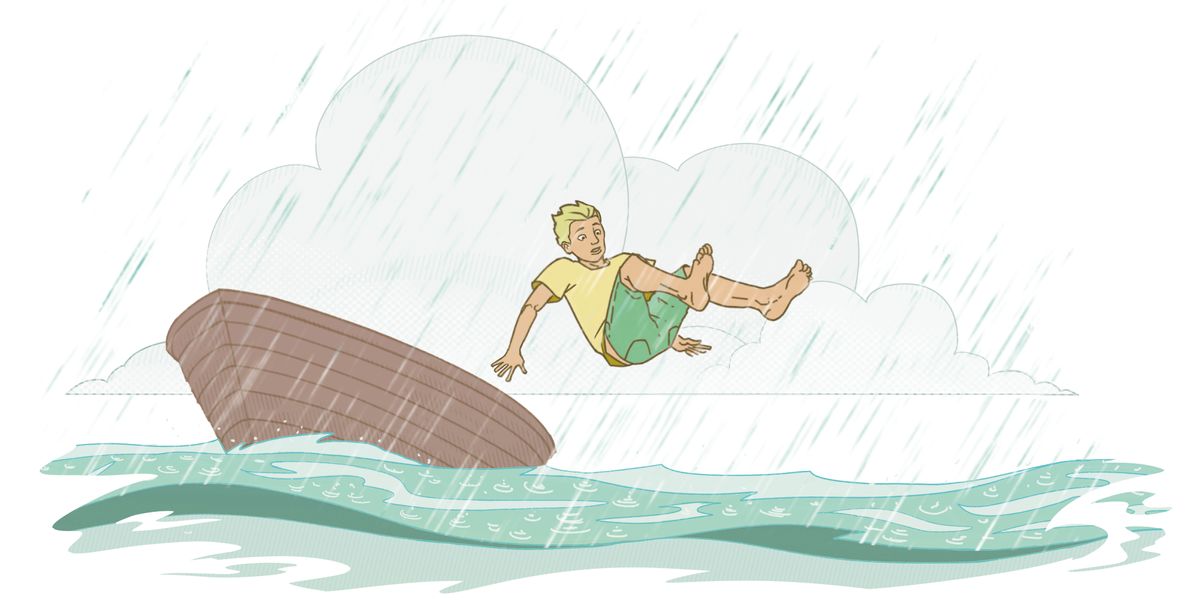 A young man jumping out of a boat into the ocean during a rainstorm.