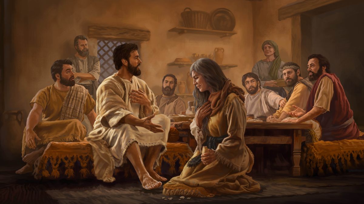 Jesus speaking in defense of Mary before his apostles as Judas criticizes her actions. Mary sits at Jesus’ oiled feet, holding an alabaster jar.