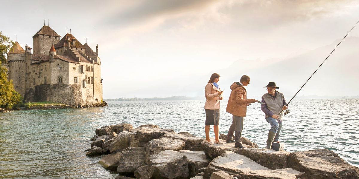 Jehovah’s Witnesses in Switzerland preach to a fisherman