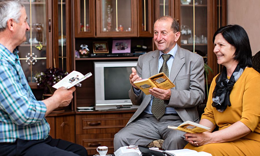 Tamazi Biblaia and his wife study the Bible with a man