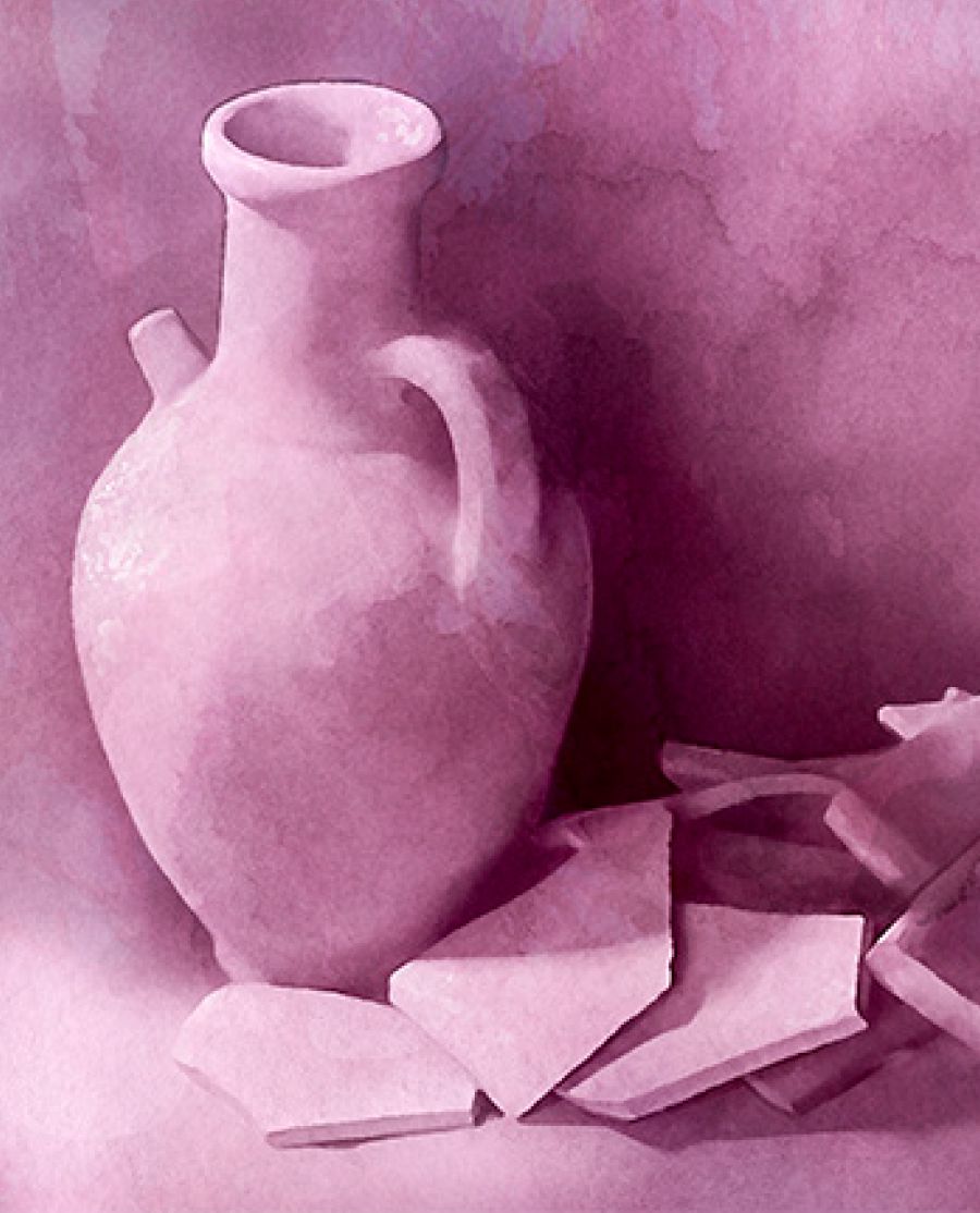 Des morceaux de poterie cassée à côté d’un récipient en argile