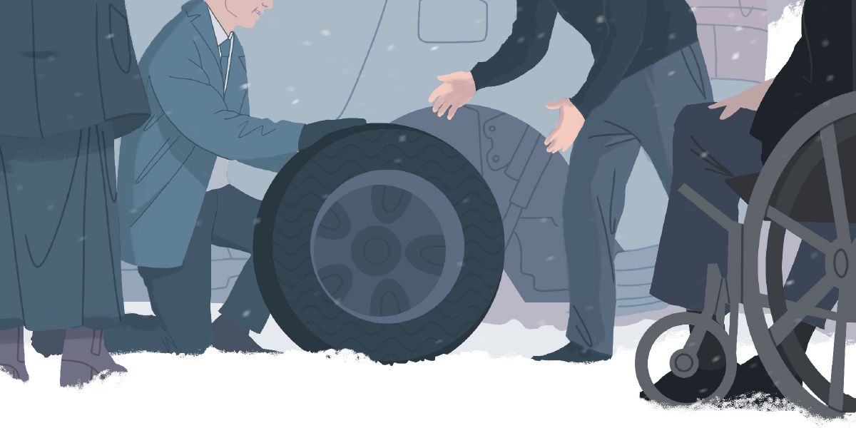 Sur le bas-côté de l’autoroute, Bob est assis dans son fauteuil roulant pendant que des jeunes Témoins changent sa roue