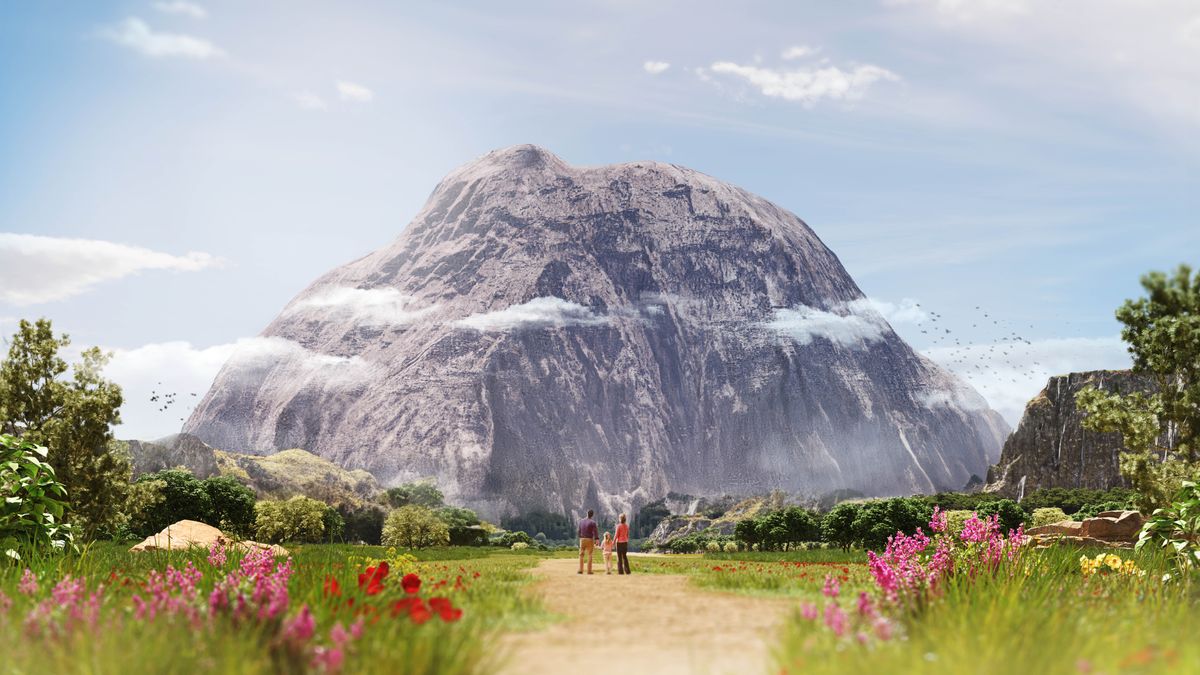 Parents with their young daughter contemplating a large rock mass in front of them.