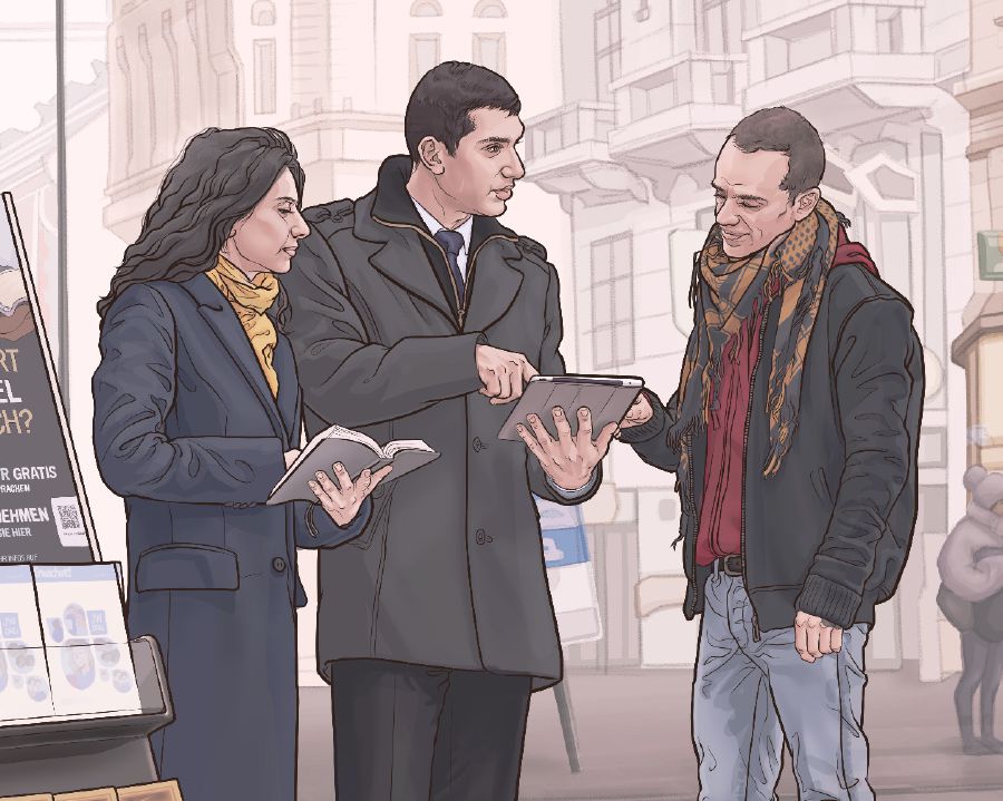Mokõi testígo de Jehová oñemboʼy peteĩ estánte ypýpe oñemoĩhápe puvlikasión ha opredika peteĩ karaípe