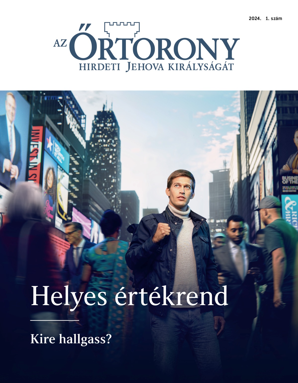 Egy fiatal férfi egy forgalmas utca közepén áll. Felfele néz, mintha keresné a jó irányt. Különböző nemzetiségű emberek haladnak el mellette.