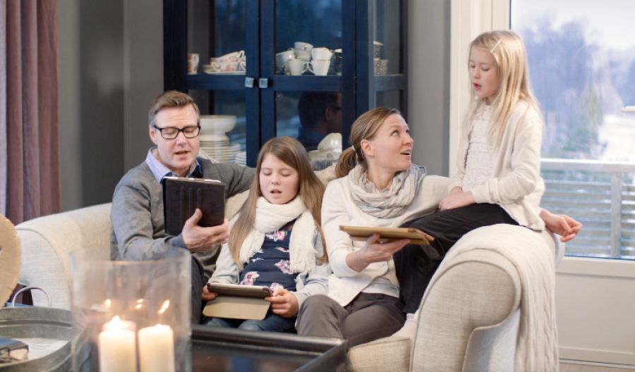 A family sings during family worship