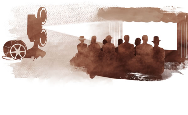 Persone che assistono a una proiezione cinematografica