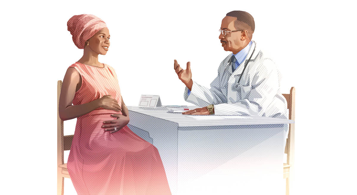 Una donna incinta parla con il suo medico.