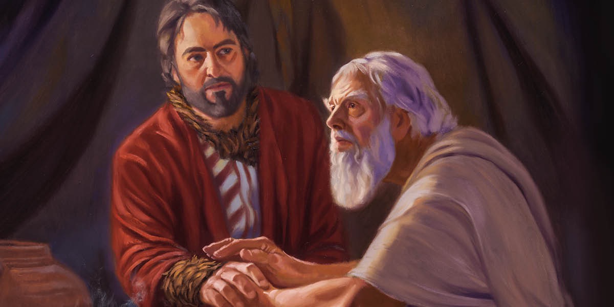 Aqûb kincên Esaw li xwe kir û stû û destên xwe bi çermê karikekê pêçand, û Îshaq dest dide destê Aqûb.