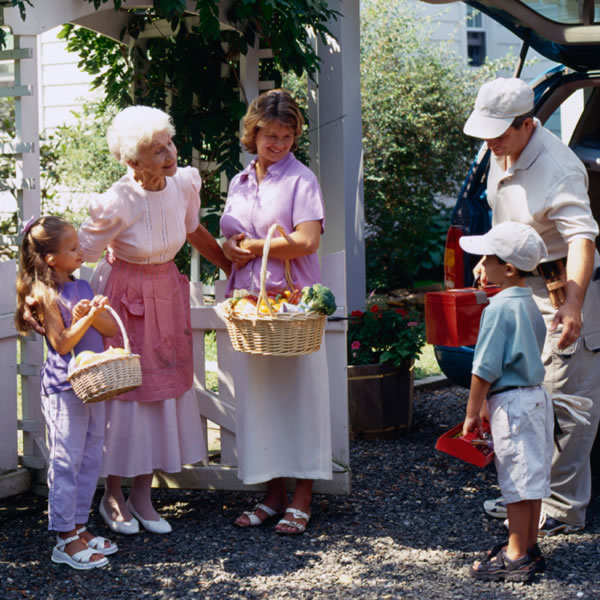 A Christian family assists an elderly woman with needed repairs and gifts of food
