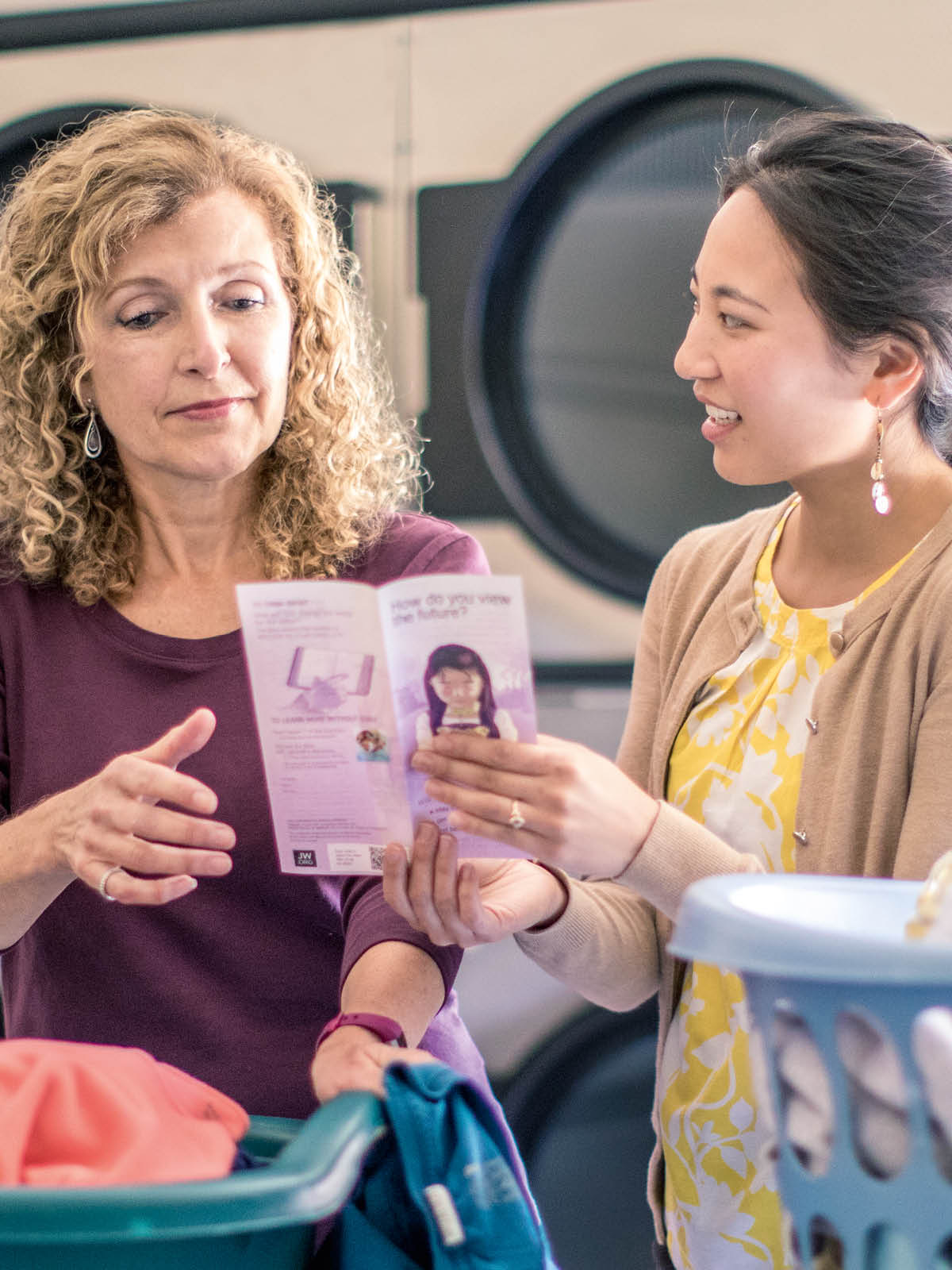 The sister giving one woman tract to the laundry.