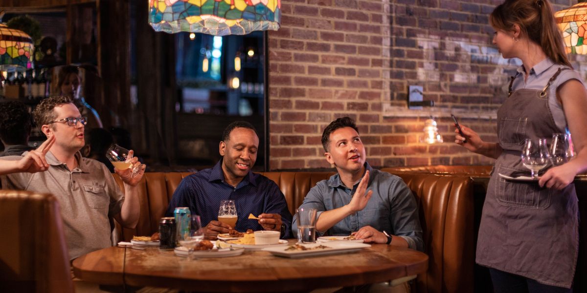 The three brothers eating in the restaurant. One of the brother drinking something that not get liquor, while the other two brothers drinking liquor. One of the brother telling her to bring more liquor for them. But the brother that was not drinking liquor say he alright.