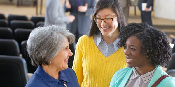Jehovah’s Witnesses from diverse ethnic groups associate together at a Kingdom Hall