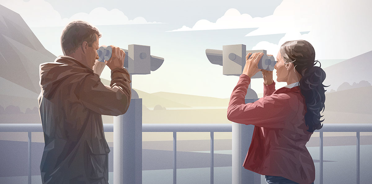 En mann og kona hans ser utover et landskap i hver sin retning