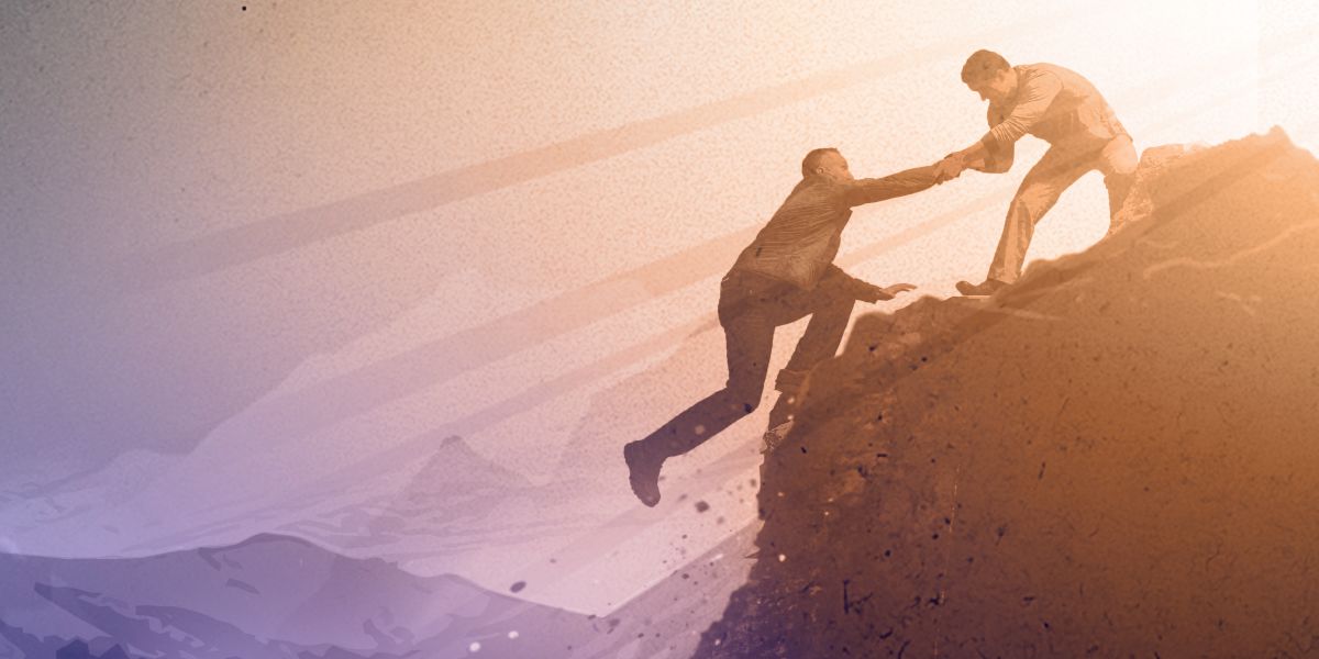 As one man want fall from on top mountain, another man come hold am for hand dey drag am come up so that e no go fall