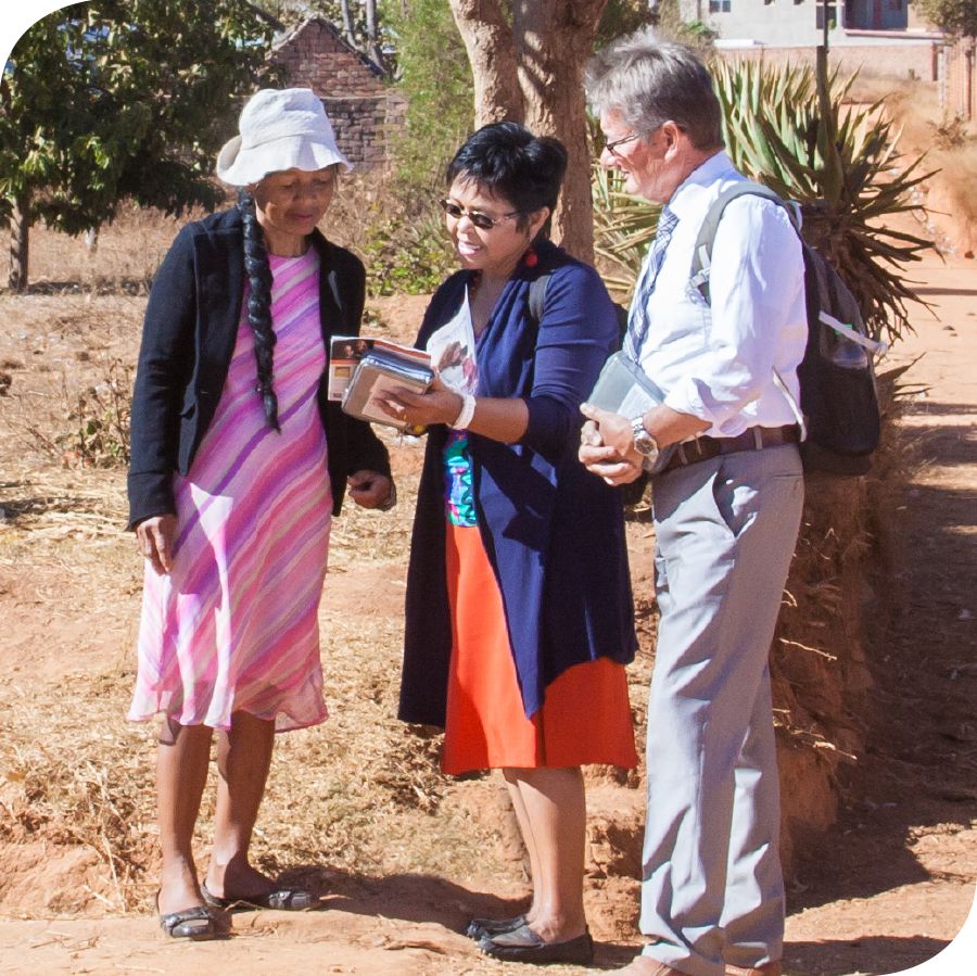 Nadine and Didier dey preach to one woman