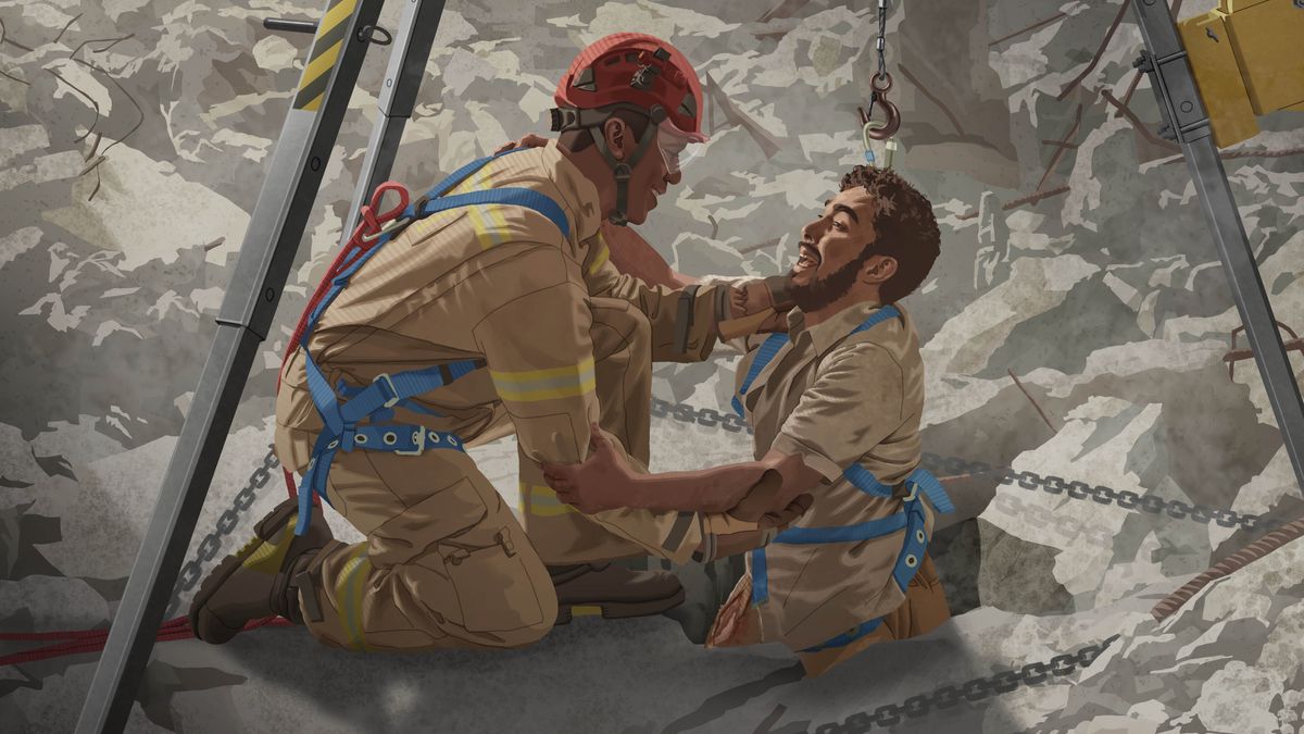 Mężczyzna przedstawiony na ilustracji w poprzednim artykule, który był uwięziony w gruzach zawalonego budynku, zostaje z nich wyciągnięty przez ratownika.
