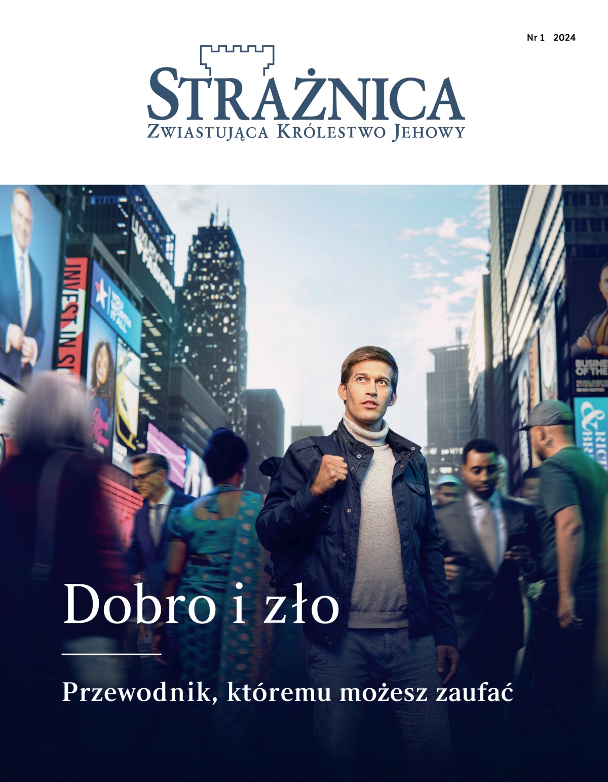 Młody mężczyzna stoi na zatłoczonej ulicy. Mijają go ludzie różnej narodowości i pochodzący z różnych środowisk. Patrzy w górę, jakby szukał odpowiedniego kierunku.