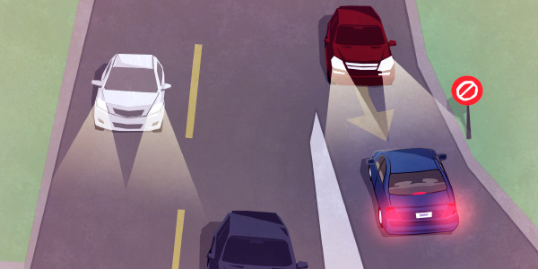 Um motorista ignora um sinal de trânsito e conduz em contramão