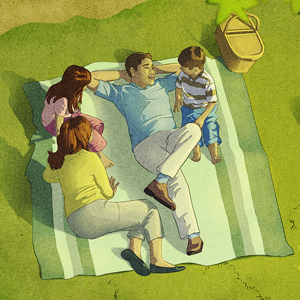 Rodina si užíva piknik v raji