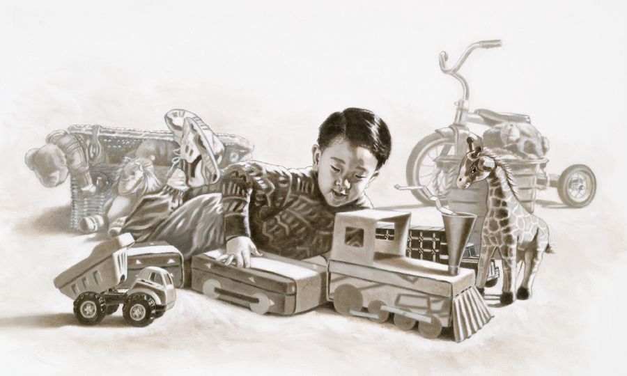 Chlapec sa hrá s hračkami