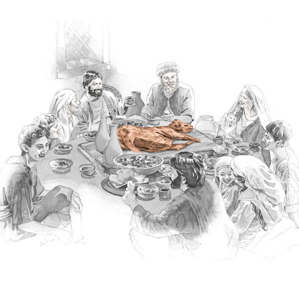 Ľudia sú zhromaždení okolo stola, na ktorom leží baránok Pesach