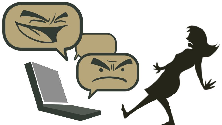 Dievča ustupuje pred monitorom počítača, lebo sa stalo terčom kyberšikanovania