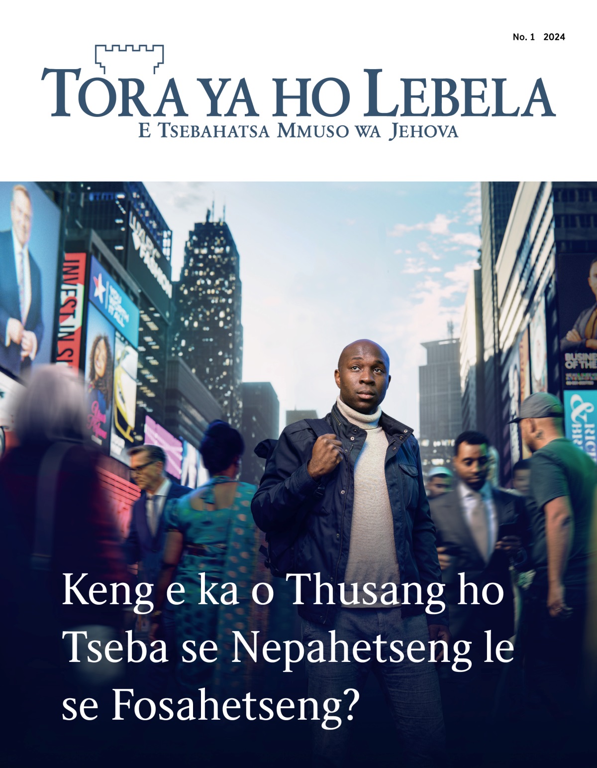 Mohlankana o eme toropong e sephethephethe. Batho ba merabe e fapaneng ba feta pel’a hae. O shebile holimo joalokaha eka o batla tsela.