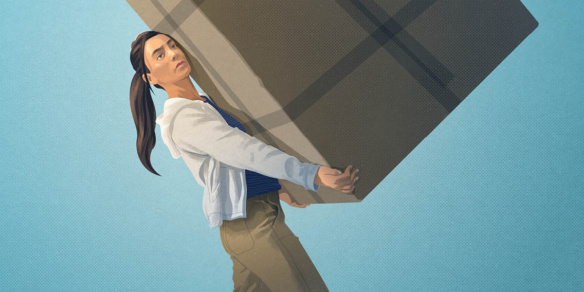 Joven feto neʼebé sente susar tebes atu lori kaixa boot.