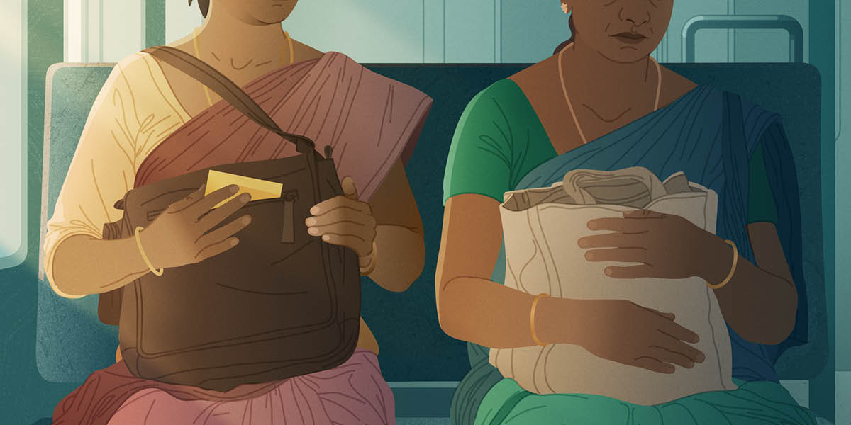 Dalawang babaeng magkatabi sa loob ng tren.