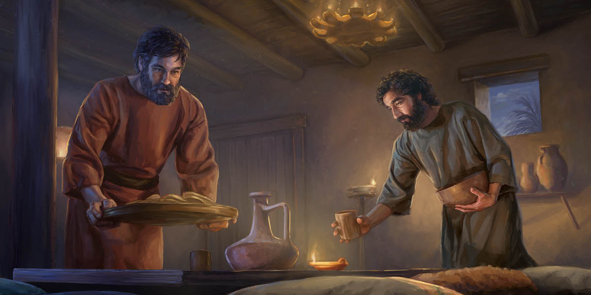 Peter and John de arrange bread and cups ontop table.