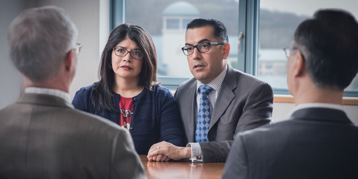 Two brothers meet with one husband and wife and tell them say Jehovah’s organization don change their assignment from Bethelite to regular pioneer