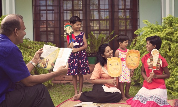 A family in Sri Lanka acting out a Bible story